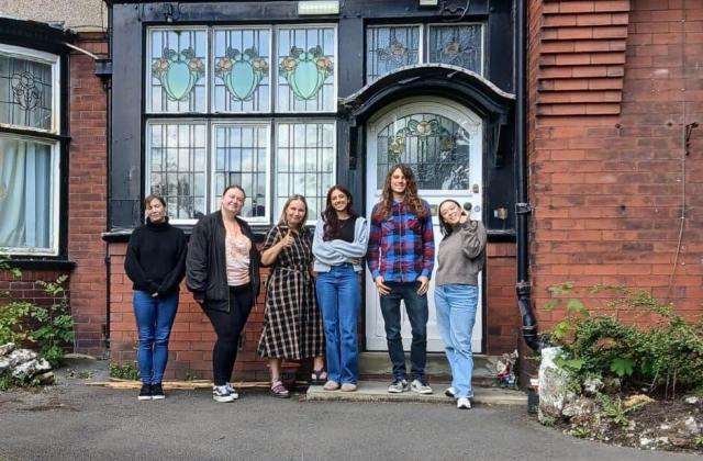 'Team Ashurst' celebrating the latest CQC inspection report in 2025.